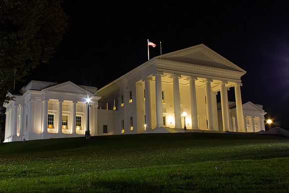 Virginia State Capitol on the lawn at night