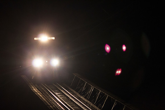 Night Train crossing over the flood wall.