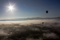 Sunburst Balloon Above the Clouds